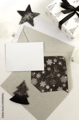 Christmas background with envelopes, invitation card, gift box, decorations i...
