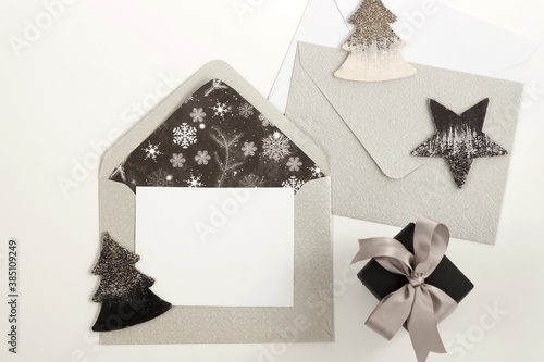Christmas background with envelopes, invitation card, gift box, decorations i...