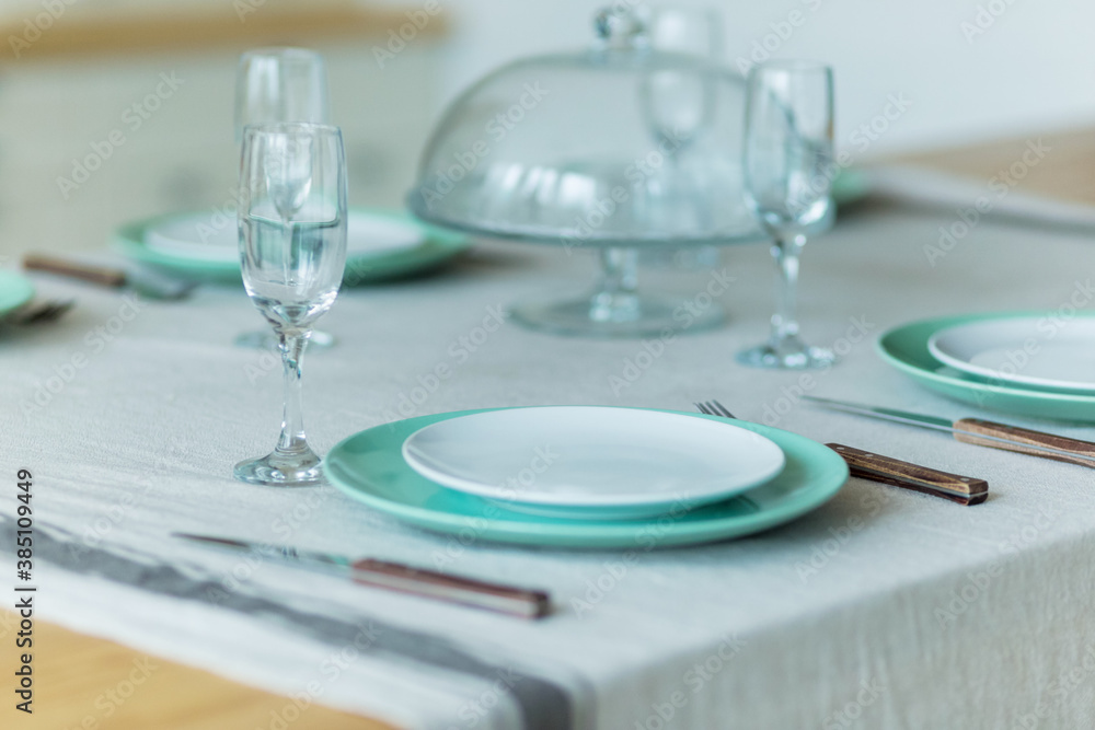 Elegant table setting dinner for an event party or family celebration at home Elegant table setting dinner for an event party or family celebration at home