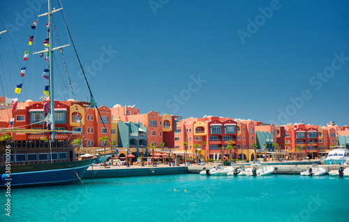 Wallpaper Mural panoramic seascape on colorful Marina promenade street from Red Sea with moored motor yachts. Marina, Hurghada, Egypt Torontodigital.ca