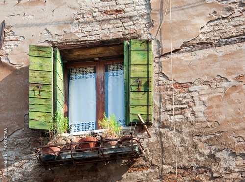 Green shutters window