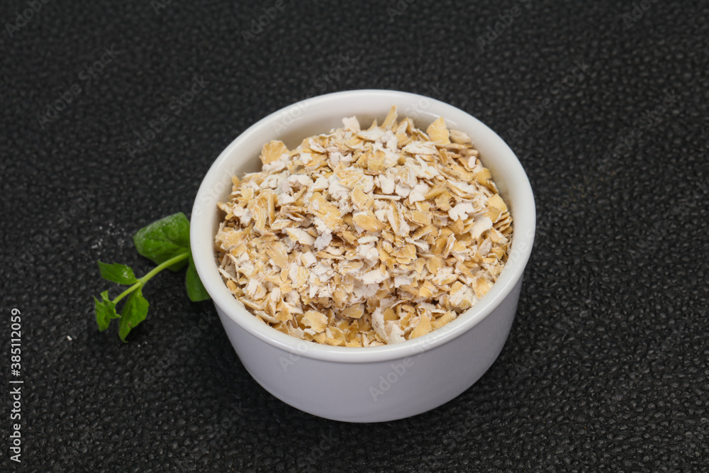 Raw oats in the bowl Raw oats in the bowl