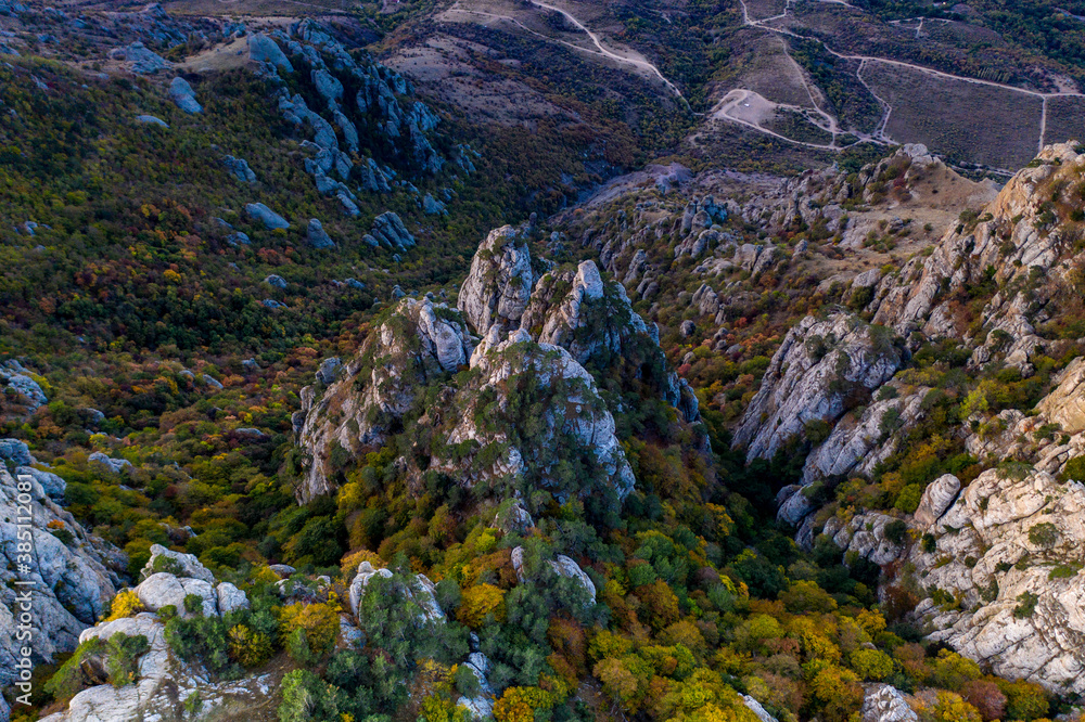 yellow autumn mountains against a background of blue haze and storm clouds yellow autumn mountains against a background of blue haze and storm clouds