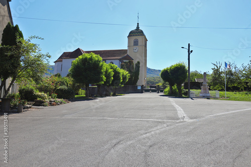 Beautiful view of a city church in France. In the rays of the setting sun. 