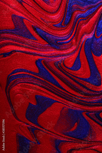Vertical red and blue shimmer abstract background. Make up concept.Beautiful stains of liquid nail laquers.Fluid art,pour painting technique.Horizontal banner,can be used as backdrop for chat.