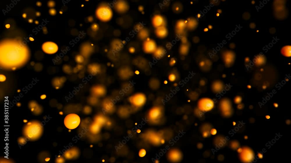 Explosion of orange juice in slow motion on isolated black background