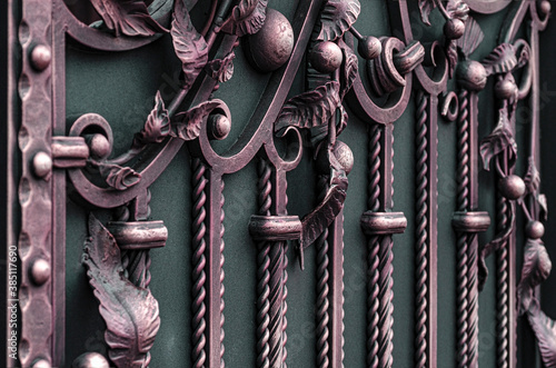 Decorative forged metal gate elements in pink