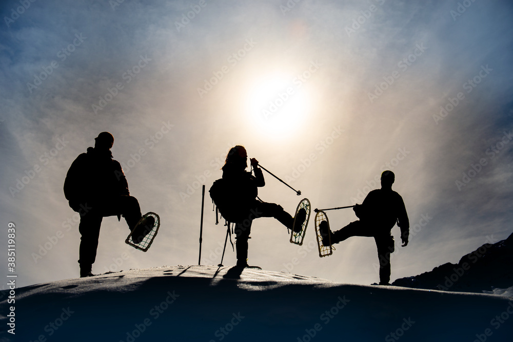 Obraz premium winter walking, sports and team friendship environment