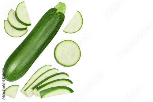 Fresh sliced zucchini isolated on white background. Top view with copy space for your text. Flat lay