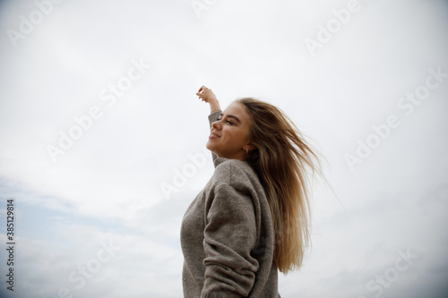 Bliss. Young girl looks at the sky