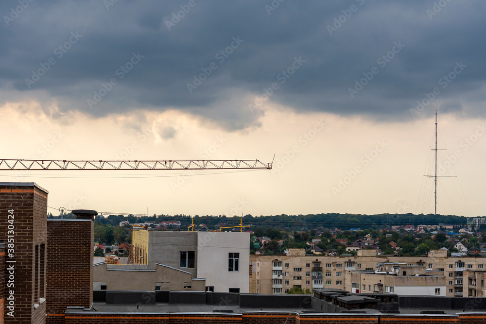 Construction crane. Construction site in sunset