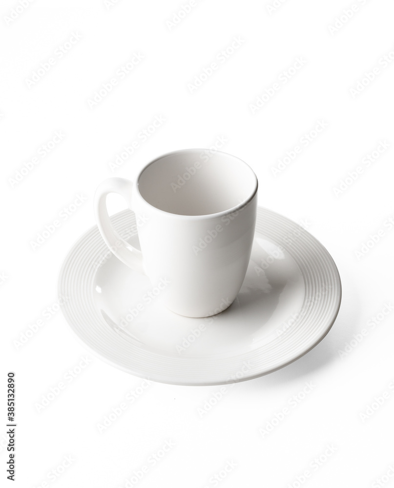 Porcelain cups and plates on white background, photo taken in studio Porcelain cups and plates on white background, photo taken in studio