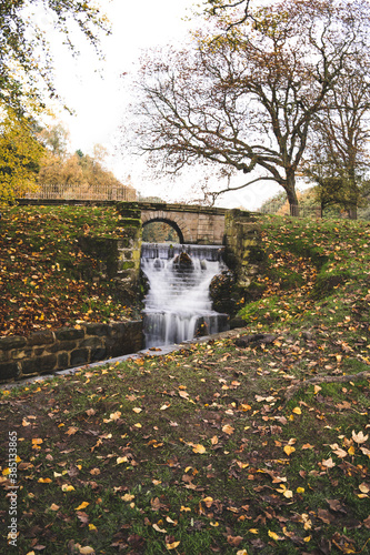 Autumn in Nostell Priory, waterfall, England, UK photo