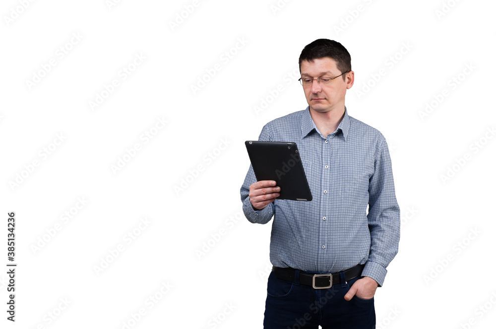 Portrait of his he nice attractive intellectual mature man holding in hands ebook analyzing searching information e-banking isolated over light gray pastel color background Portrait of his he nice attractive intellectual mature man holding in hands ebook analyzing searching information e-banking isolated over light gray pastel color background