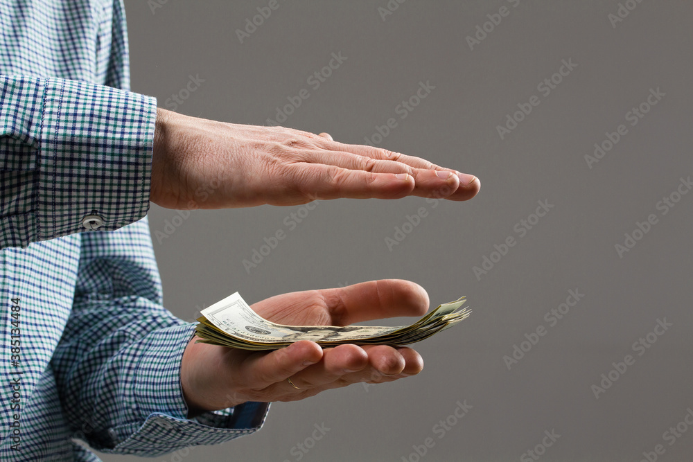 Obraz premium Money in your pocket. money in hands