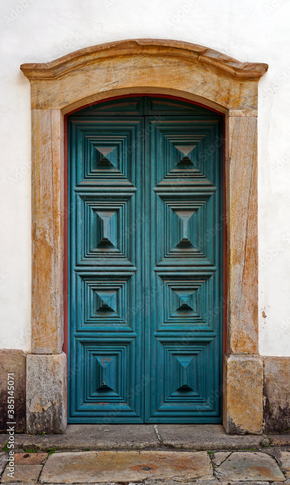 Ancient colonial door in historical city of Ouro Preto, Brazil