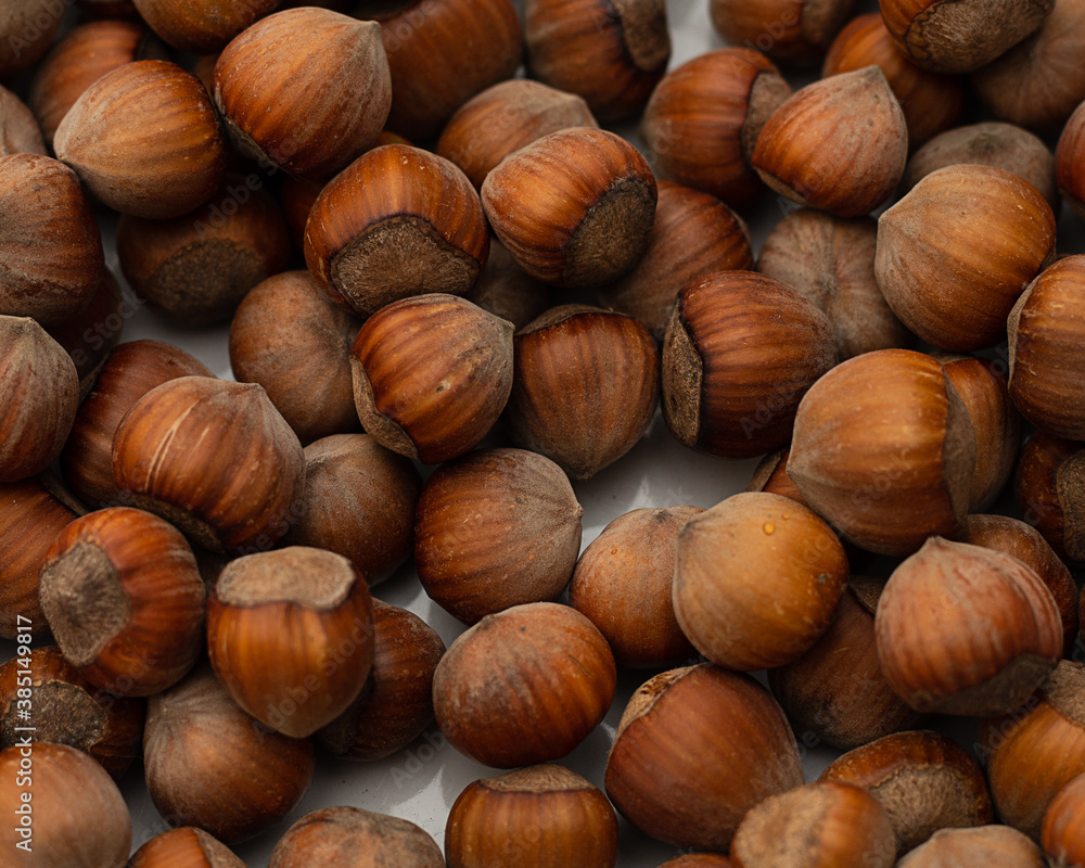 Hazelnuts. Stack of hazelnuts. Food background. Hazelnut background Hazelnuts. Stack of hazelnuts. Food background. Hazelnut background