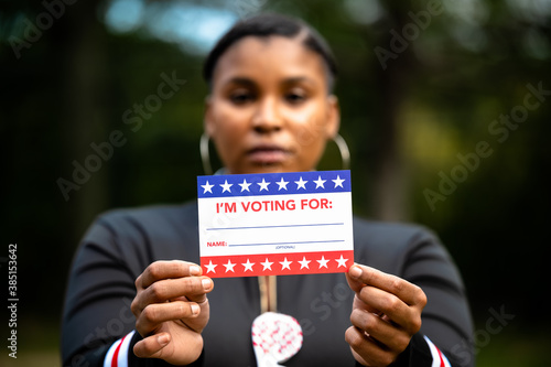 Hispanic Woman Holding A Blank I'm Voting For Sign