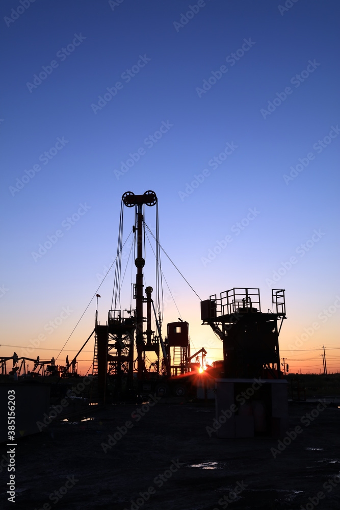 In the evening, oil field site under construction