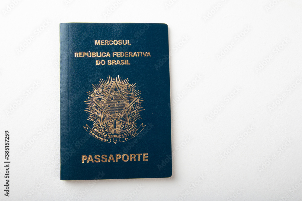 Naklejka premium Brazilian passport with white background. Copy space.