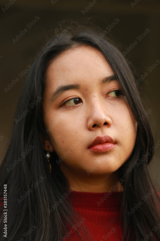 Young beautiful woman wearing red casual t-shirt.