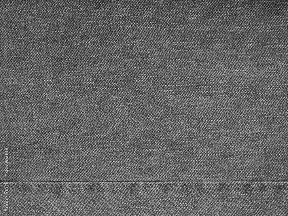 Fototapeta premium jeans pants texture abstract background a high resolution of rough black febric surface vintage western fashion style by closeup detail of denim
