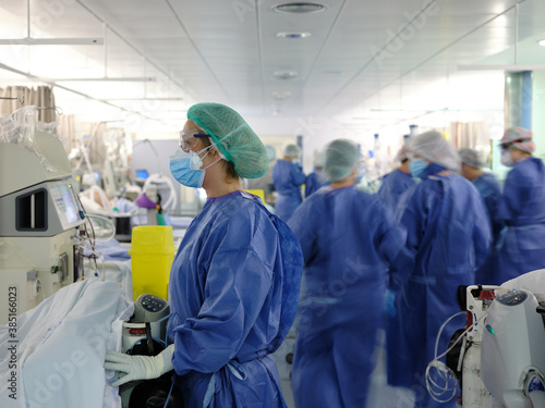 Healthcare staff at work in the icu photo