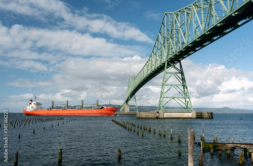 Photos Container Ship near the Astoria-Megler Bridge on the Columbia River at Astoria,