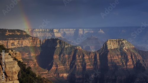 Thunderstorm, rainbow, view from Bright Angel Point with the last light of the day on Wotan's Throne, Walhalla Plateau, Deva Temple, Brahma Temple, evening mood, Grand Canyon National Park, North Rim, Arizona, United States of America, USA, North America