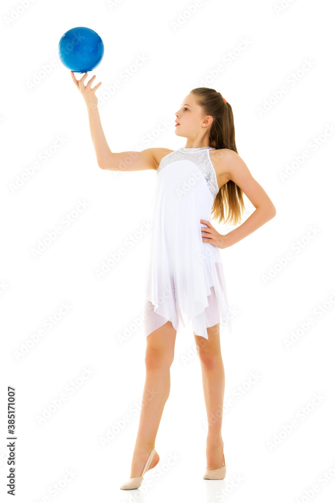 Girl gymnast performs exercises with the ball. Girl gymnast performs exercises with the ball.