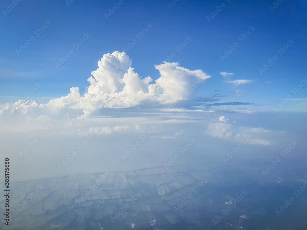 Fototapeta premium Airplane view, see clouds in the sky
