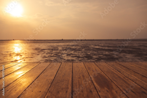 The wood floor extends into the sea when the water drops © pandaclub23