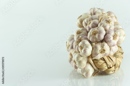 Bundle of garlic isolated on white backgrond.