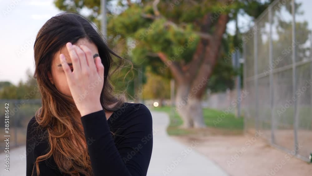 Attractive young independent hispanic woman looking happy and confident as she walks through life with a positive outlook. Attractive young independent hispanic woman looking happy and confident as she walks through life with a positive outlook.