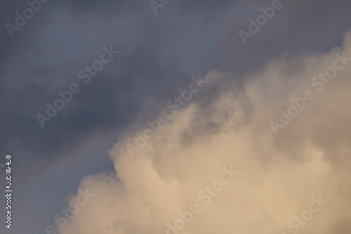 big piece of white cloud on overcast sky