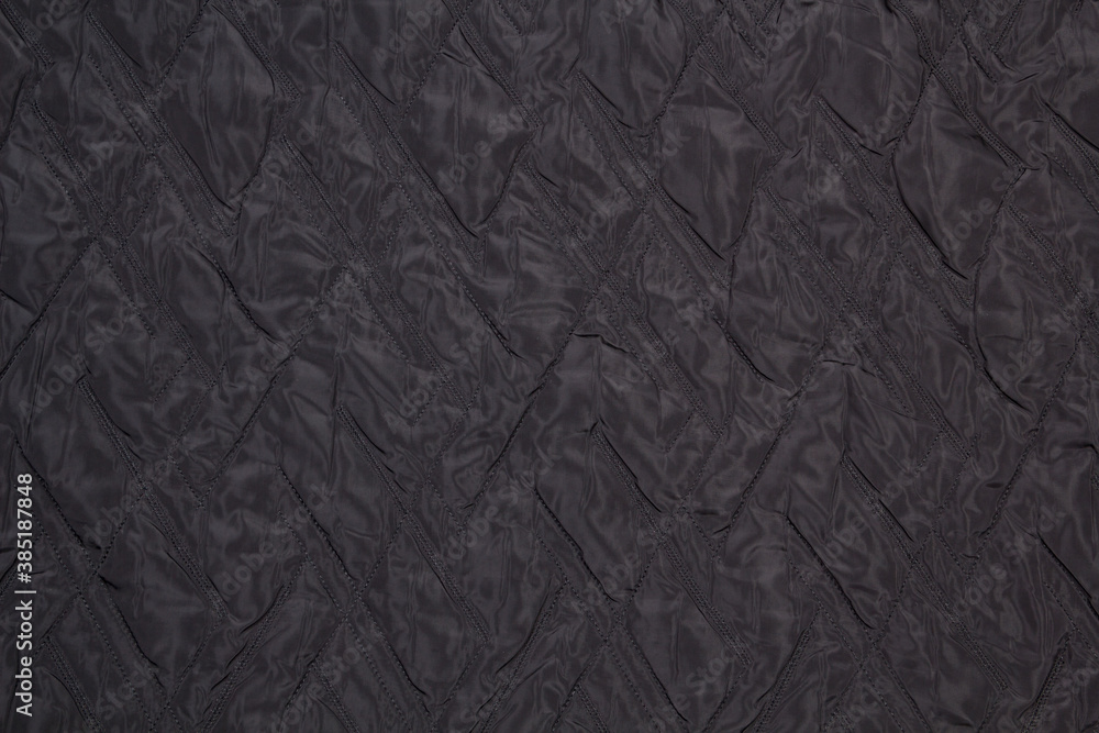 Quilted fabric. The texture of the blanket.
Quilted fabric. The texture of the blanket.