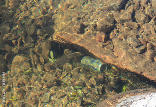 Trash on the bottom of the river