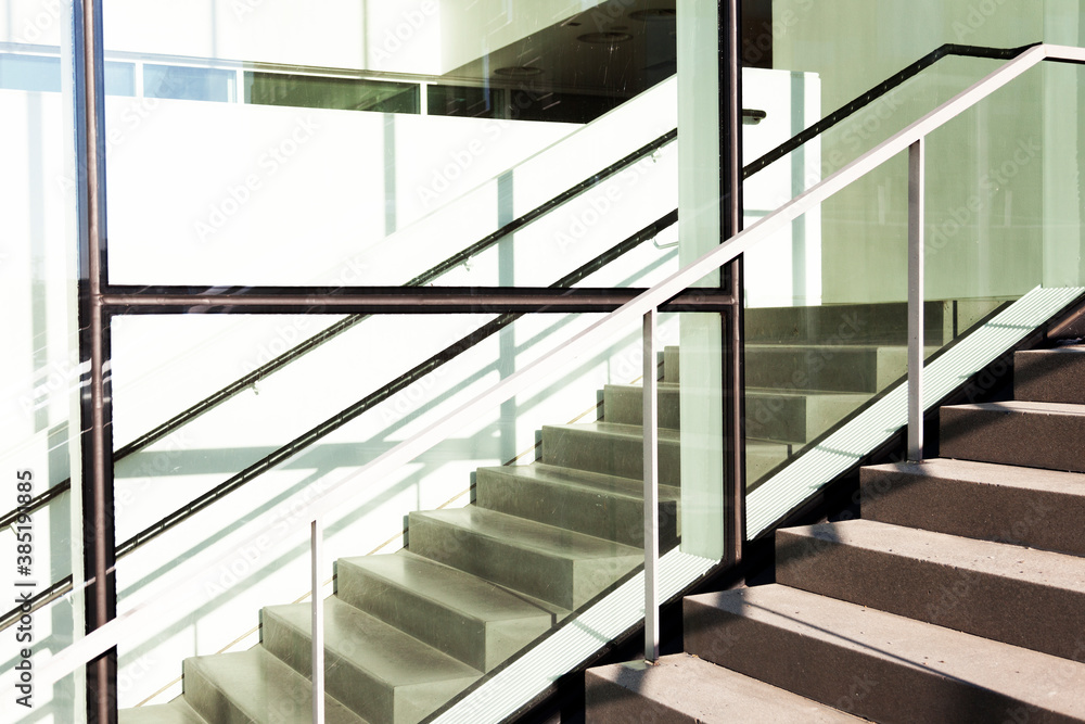Fototapeta premium large staircase outside and inside that runs parallel