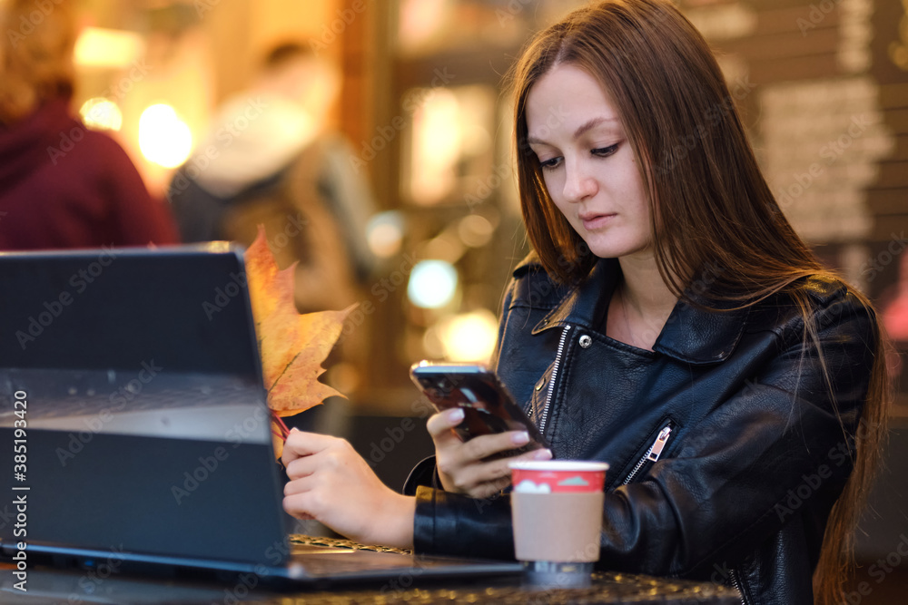 Beautiful Attractive Asian woman working with laptop smile and talking with customer in smartphone to get idea and requirement for success job outside office in coffee shop,Business Concept,Warm Tone Beautiful Attractive Asian woman working with laptop smile and talking with customer in smartphone to get idea and requirement for success job outside office in coffee shop,Business Concept,Warm Tone