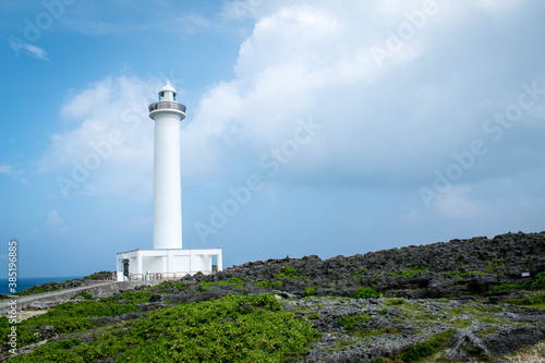 Cape Zanpa Lighthouse, Okinawa, Japan with blue sky and surrounding scenery © AP