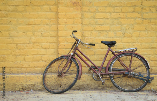 old bicycle on the wall © Divakar