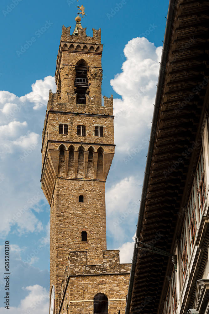 Florence, clock tower of the Palazzo Vecchio (1299) called Torre di Arnolfo, Piazza della Signoria, UNESCO world heritage site, Tuscany, Italy, Europe.