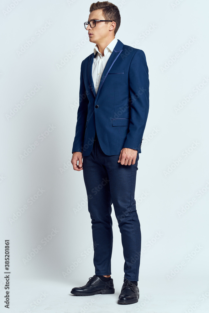 business man in suit wearing glasses self-confidence manager executive light background business man in suit wearing glasses self-confidence manager executive light background