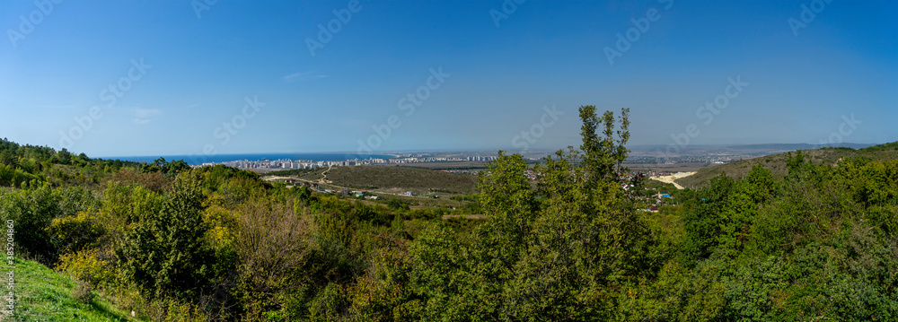 Panorama with a view of the outskirts of the city of Anapa. View from the observation deck of The beginning of the Caucasus mountains.