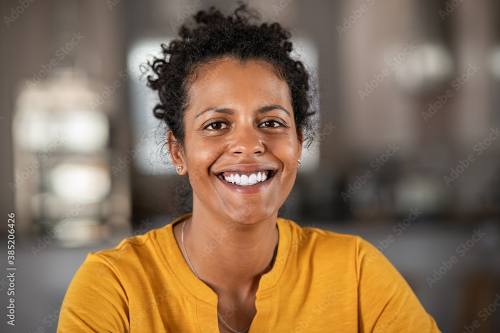 Portrait of happy african woman smiling Portrait of happy african woman smiling
