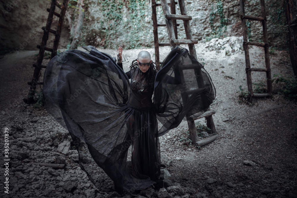 Beautiful young bald woman portrait outdoors. spiritual concept.