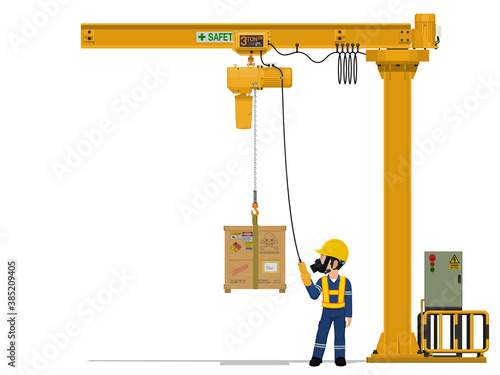 A worker is lifting hazardous material by jib crane.
