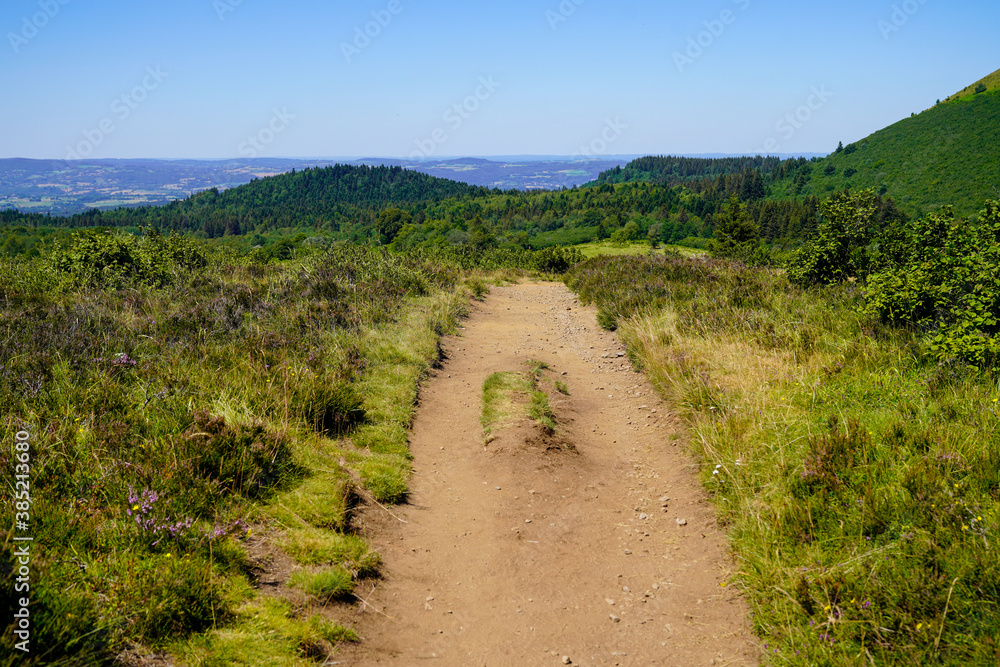 hiking trail access to the Puy de Dome volcano in Auvergne mountain france