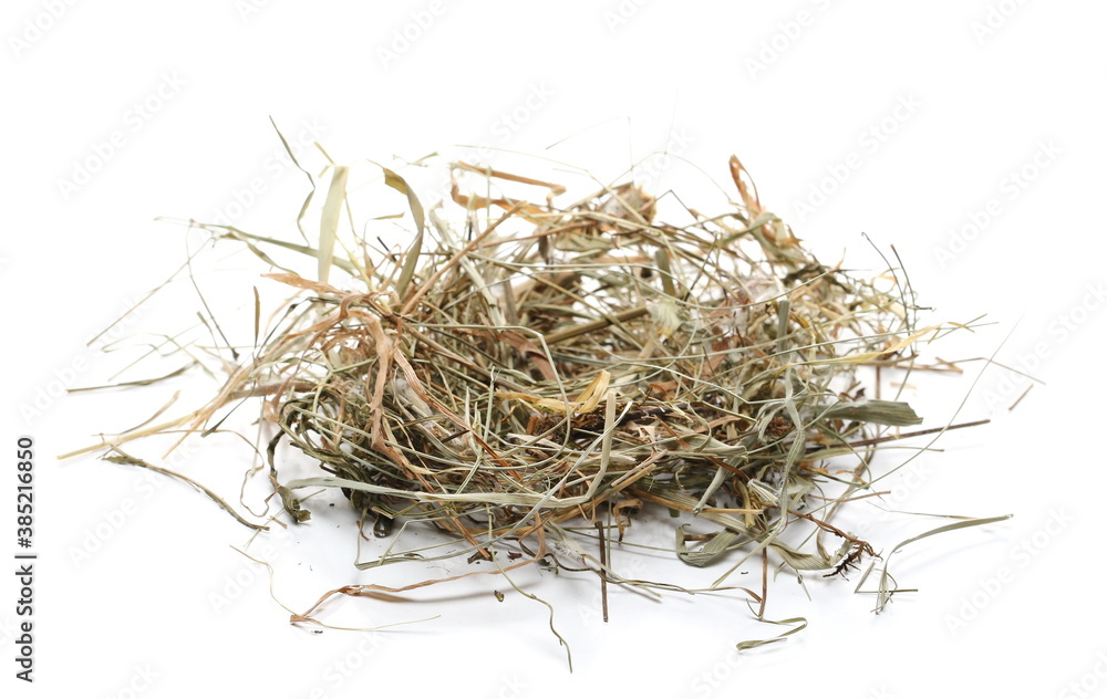 Hay pile, dry grass isolated on white background