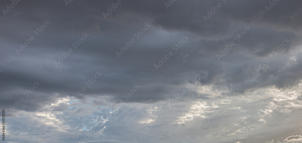 Image of a dark and cloudy sky during the day Image of a dark and cloudy sky during the day